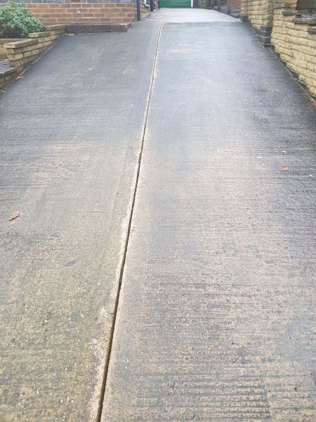 slippery concrete driveway BEFORE: Swipe To View More Images