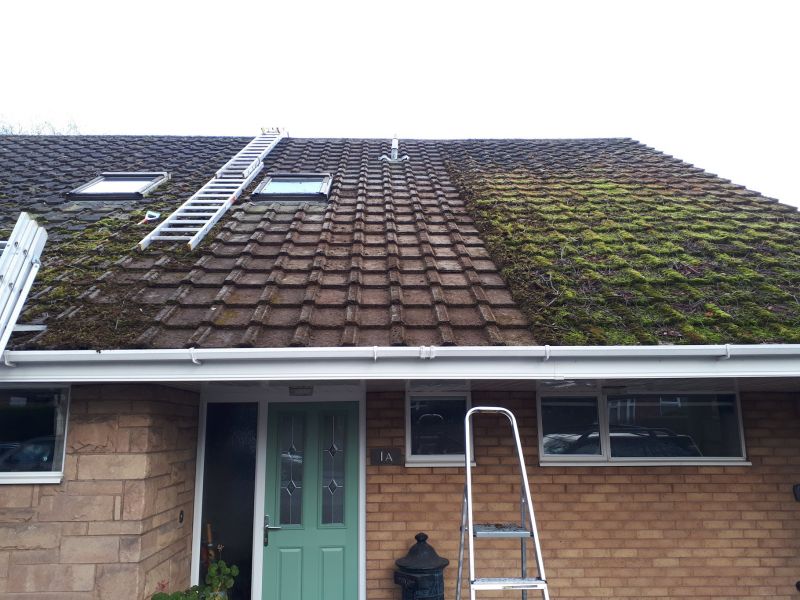 Part way through this roof moss removal, making a huge difference to the appearance!: Swipe To View More Images