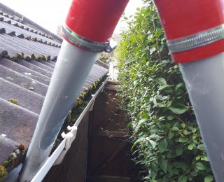Gutter clearing upto 4th story using our high powered industrial gutter vacuum systems: Click Here To View Larger Image