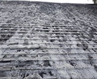 Once all the moss has been removed and Gutters Cleared, we then Treat the roof using our Soft wash pump to apply a Biocidal treatment. This treatment will Break down the Biological growth and it will weather away over the next few months. We will add a follow up photo in 12months time when we return to check all is clean and all Gutters are clear.    contact us for your free quote!: Click Here To View Larger Image