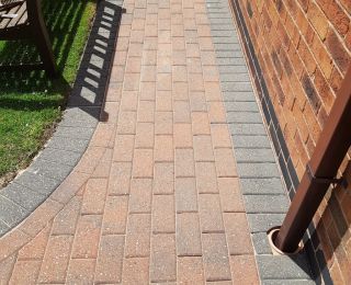 Once we had cleaned the Block paving, we allowed it time to dry fully before we resanded the joints. We then sealed it to protect and prolong the life of this driveway in underwood, check out the next picture to see the cleaned & sealed block paved driveway.: Click Here To View Larger Image
